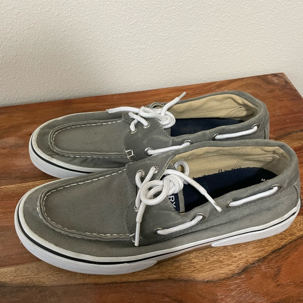 Sperry slip on boat shoes. Grey with white accents.